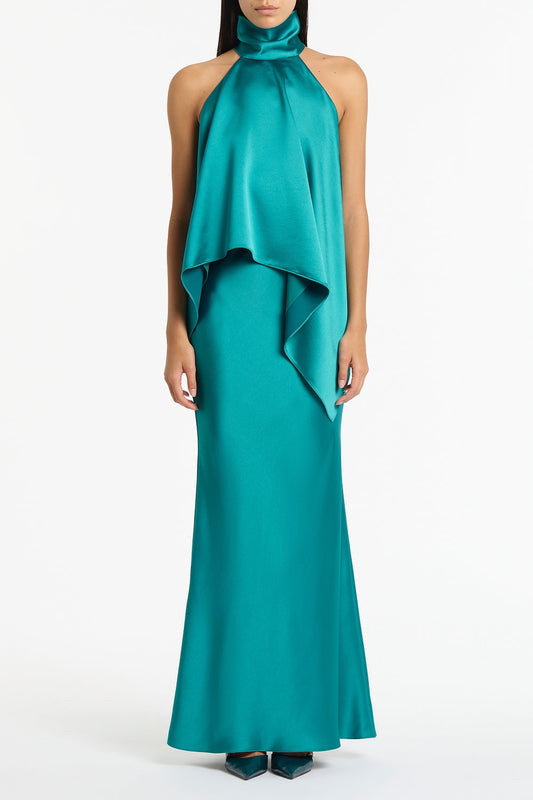 Image of a model wearing Skirts. Product name - Viridian Lustre Satin Bias Fishtail Skirt in Green colour by brand - Carla Zampatti