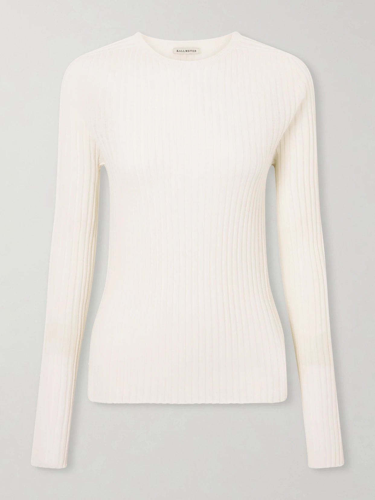 Image of a model wearing Outerwear. Product name - Fabi Ribbed Merino Wool Top in Ivory colour by brand - KALLMEYER