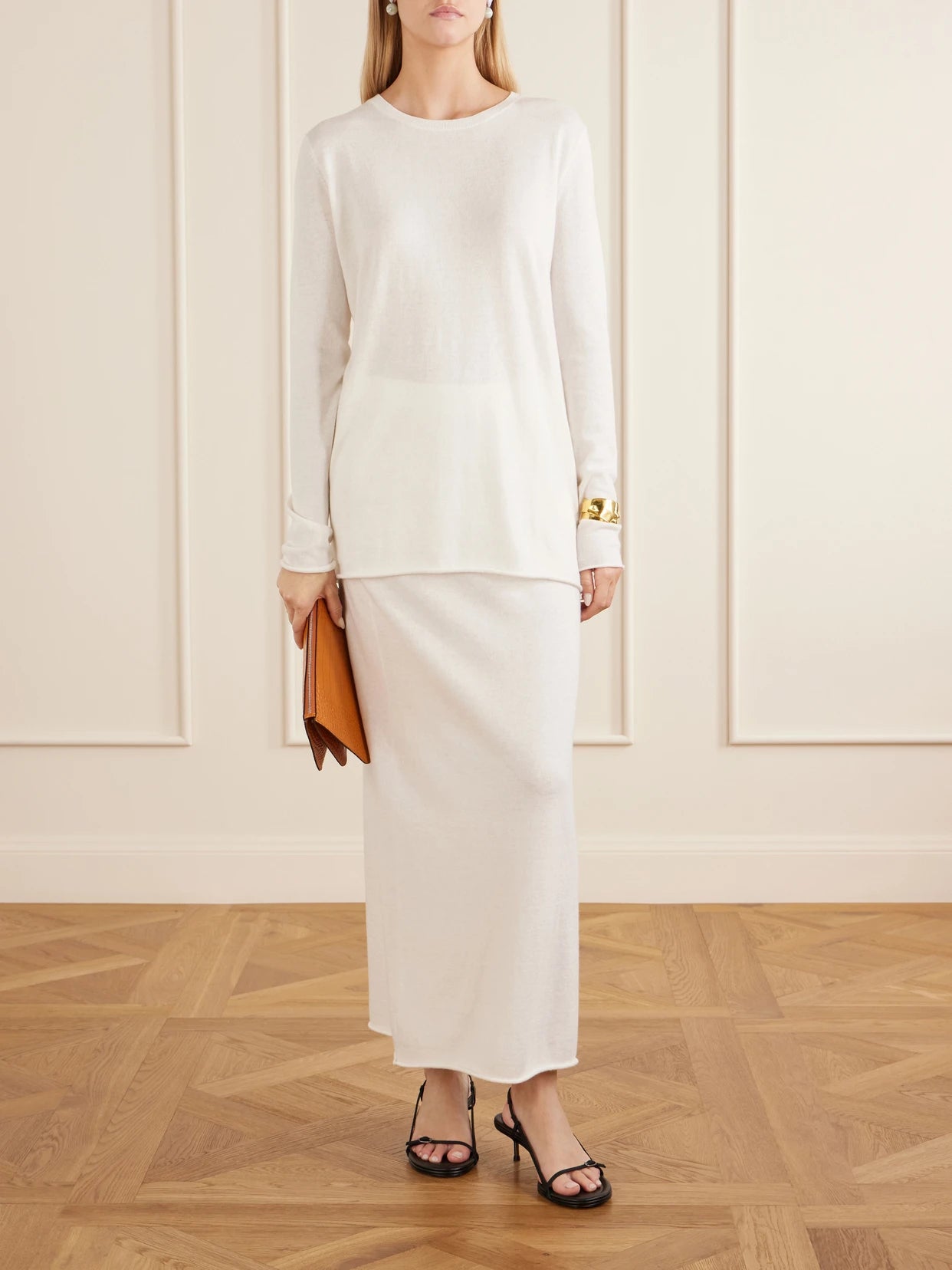 Image of a model wearing Outerwear. Product name - Maurie & Charlotta Cotton And Cashmere-blend Sweater And Maxi Skirt Set in White colour by brand - LISA YANG