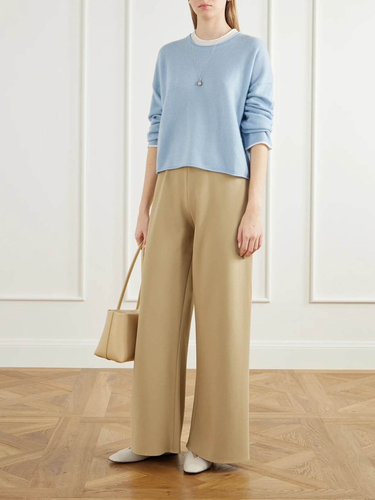 Image of a model wearing Outerwear. Product name - Dominick Cashmere And Silk-blend Sweater in Blue colour by brand - La Ligne
