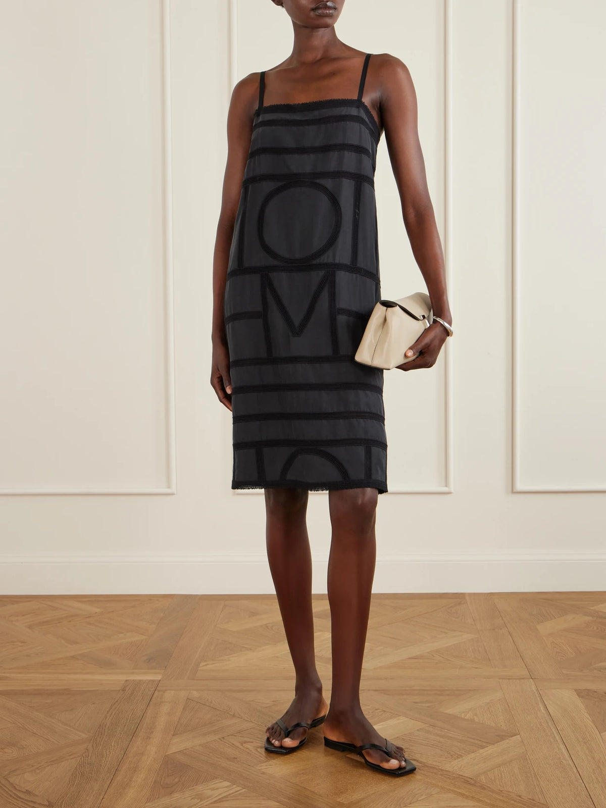 Image of Dresses. Product name - Embroidered Silk Midi Dress in Black colour by brand - TOTEME