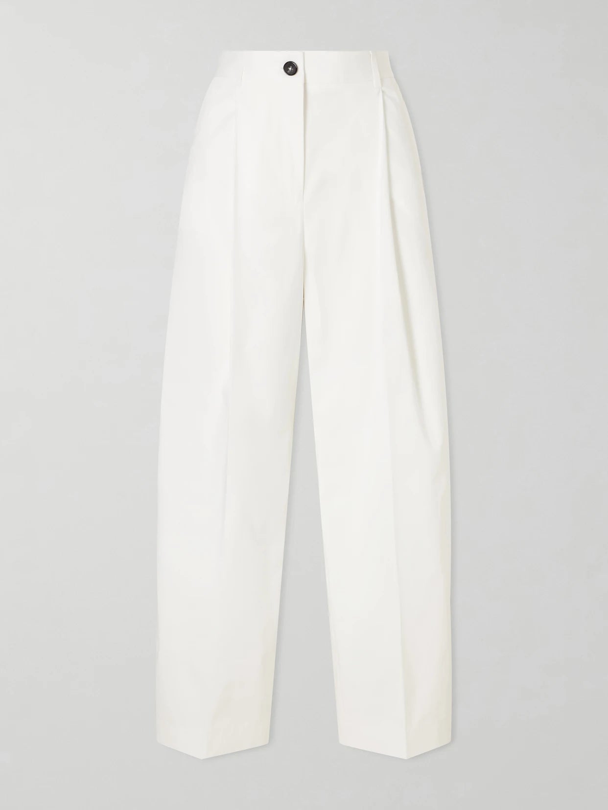 Image of a model wearing Pants. Product name - Pleated Cotton Wide-leg Trousers in White colour by brand - TOTEME