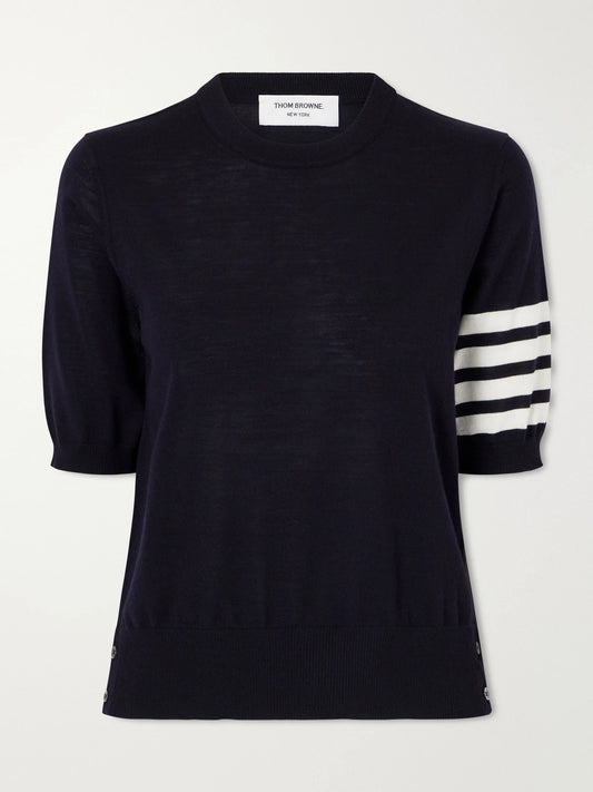 Image of a model wearing Outerwear. Product name - Grosgrain-trimmed Striped Wool-blend Sweater in Navy colour by brand - Thom Browne