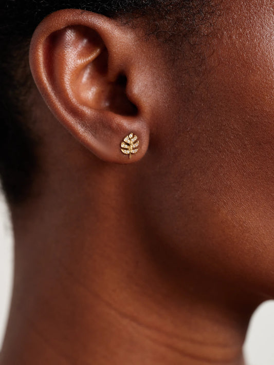 Image of Earrings. Product name - Tiny Monstera Leaf 14-karat Gold Diamond Earrings in Multi colour by brand - Sydney Evan