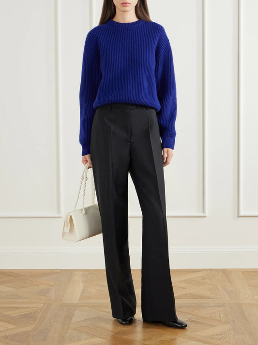 Image of a model wearing Pants. Product name - Wool And Mohair-blend Canvas Wide-leg Pants in Black, Navy colour by brand - Jil Sander