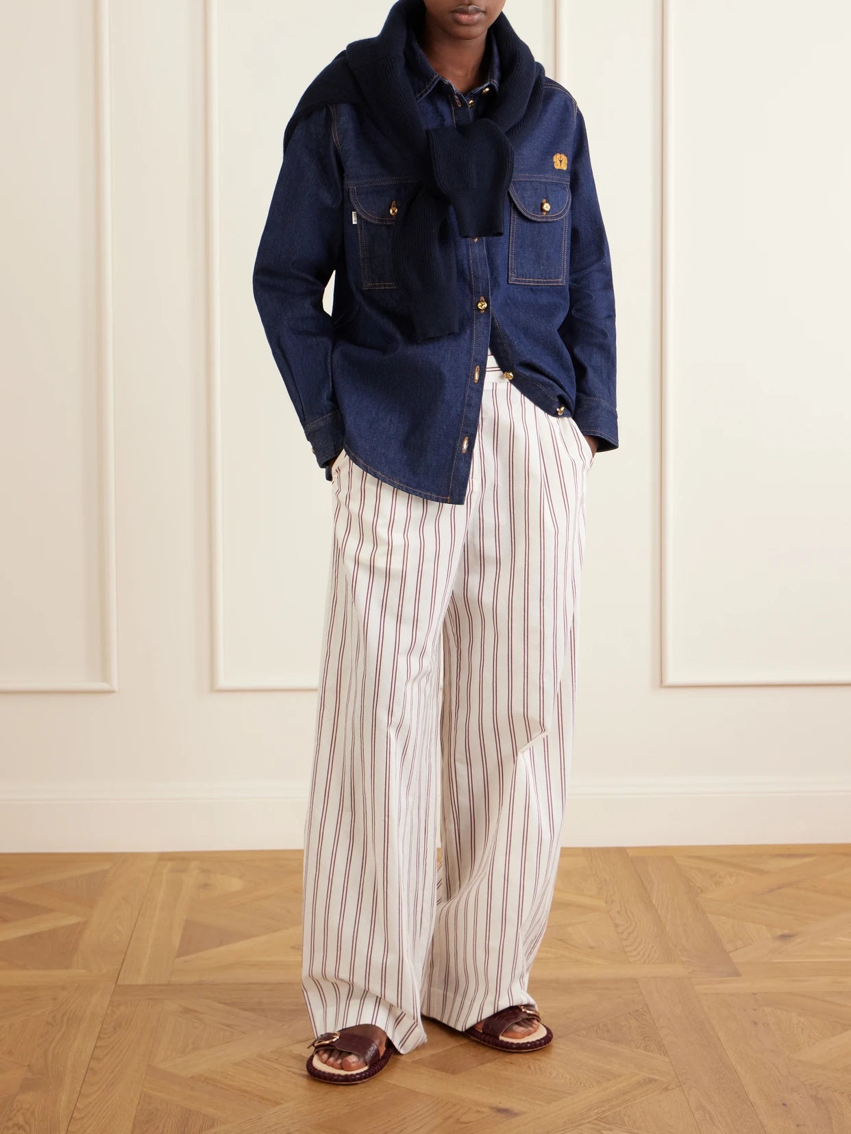 Image of a model wearing Pants. Product name - Hudson St Pleated Striped Cotton And Silk-blend Wide-leg Pants in White colour by brand - TWP