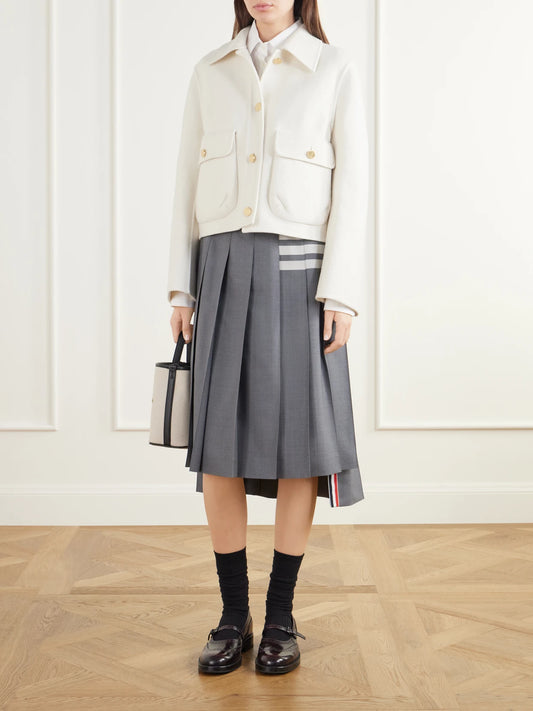 Image of a model wearing Skirts. Product name - Pleated 4-bar Woven Wool Midi-skirt in Gray colour by brand - Thom Browne
