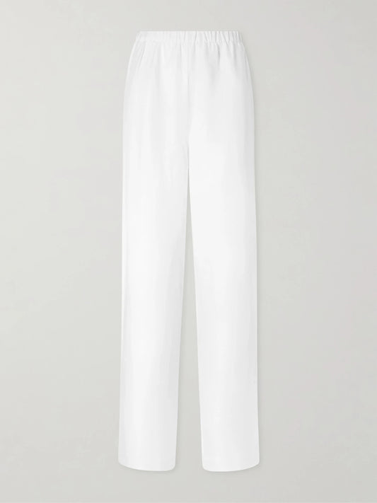 Image of a model wearing Pants. Product name - Roslyn Woven Wide-leg Pants in Ivory colour by brand - Anine Bing