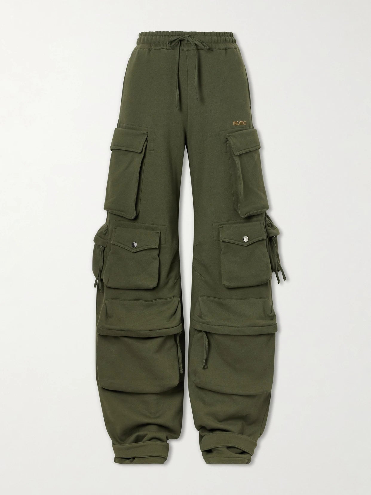 Image of a model wearing Pants. Product name - Cotton Tapered Cargo Pants in Green colour by brand - The Attico
