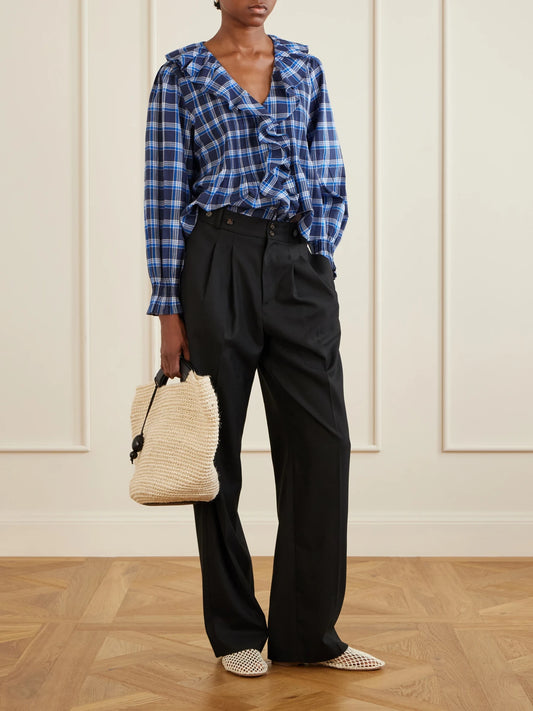 Image of a model wearing Tops. Product name - Hardy Checked Shirred Organic Cotton Blouse in Navy colour by brand - DÔEN