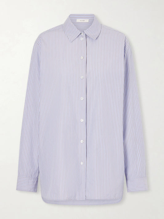 Image of a model wearing Tops. Product name - Sisilia Cotton-poplin Shirt in Light blue colour by brand - The Row