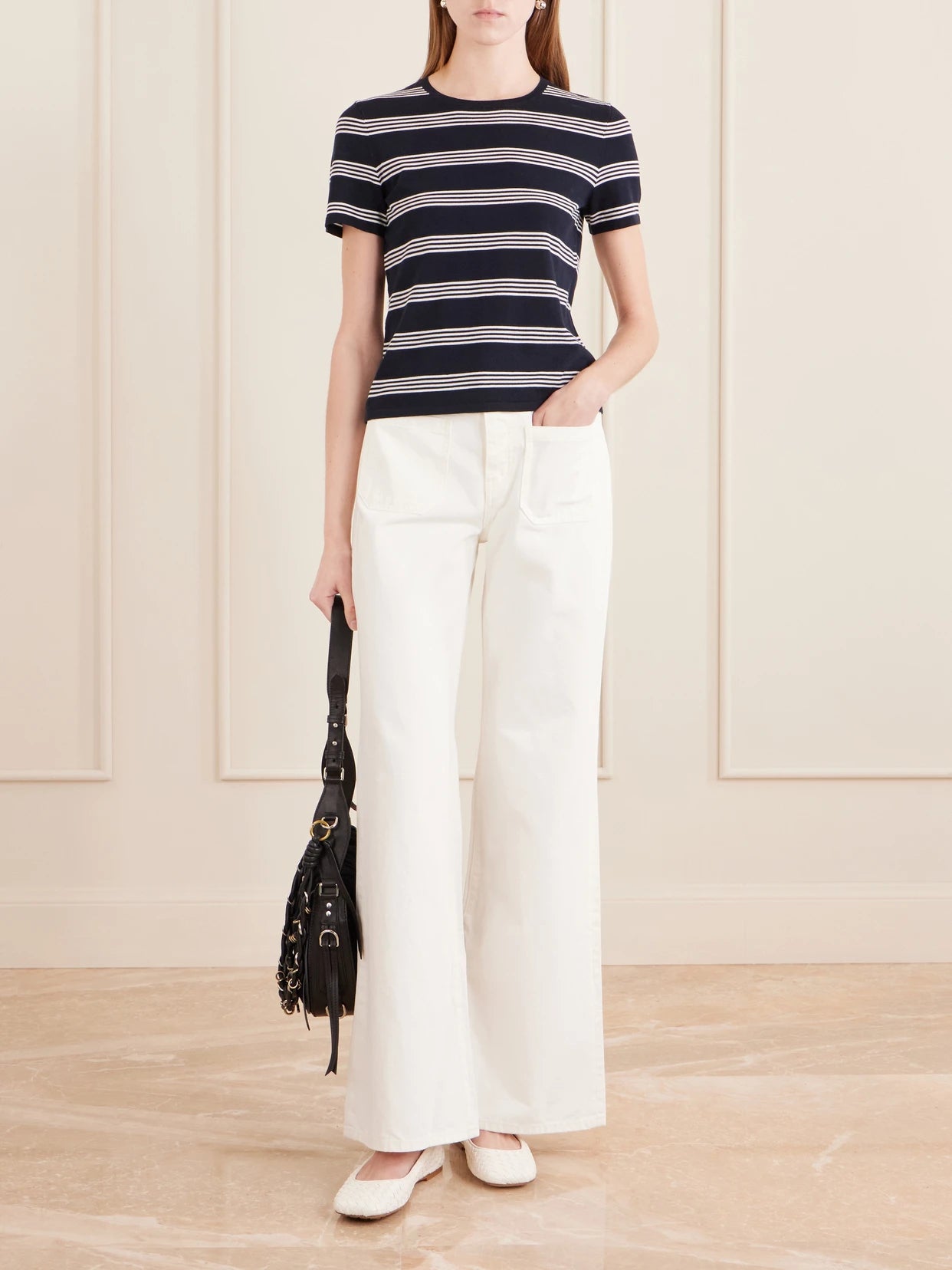 Image of Jeans. Product name - Florence High-rise Distressed Flared Jeans in Cream colour by brand - Nili Lotan