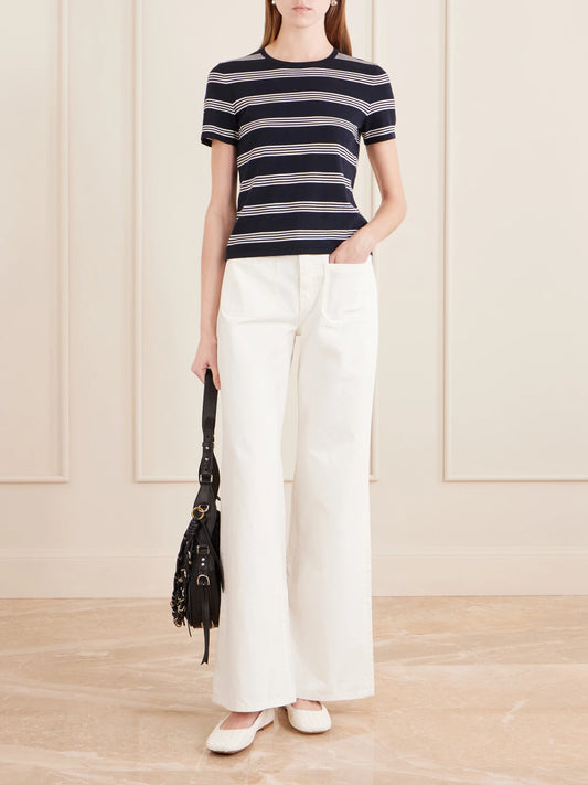 Image of Jeans. Product name - Florence High-rise Distressed Flared Jeans in Cream colour by brand - Nili Lotan