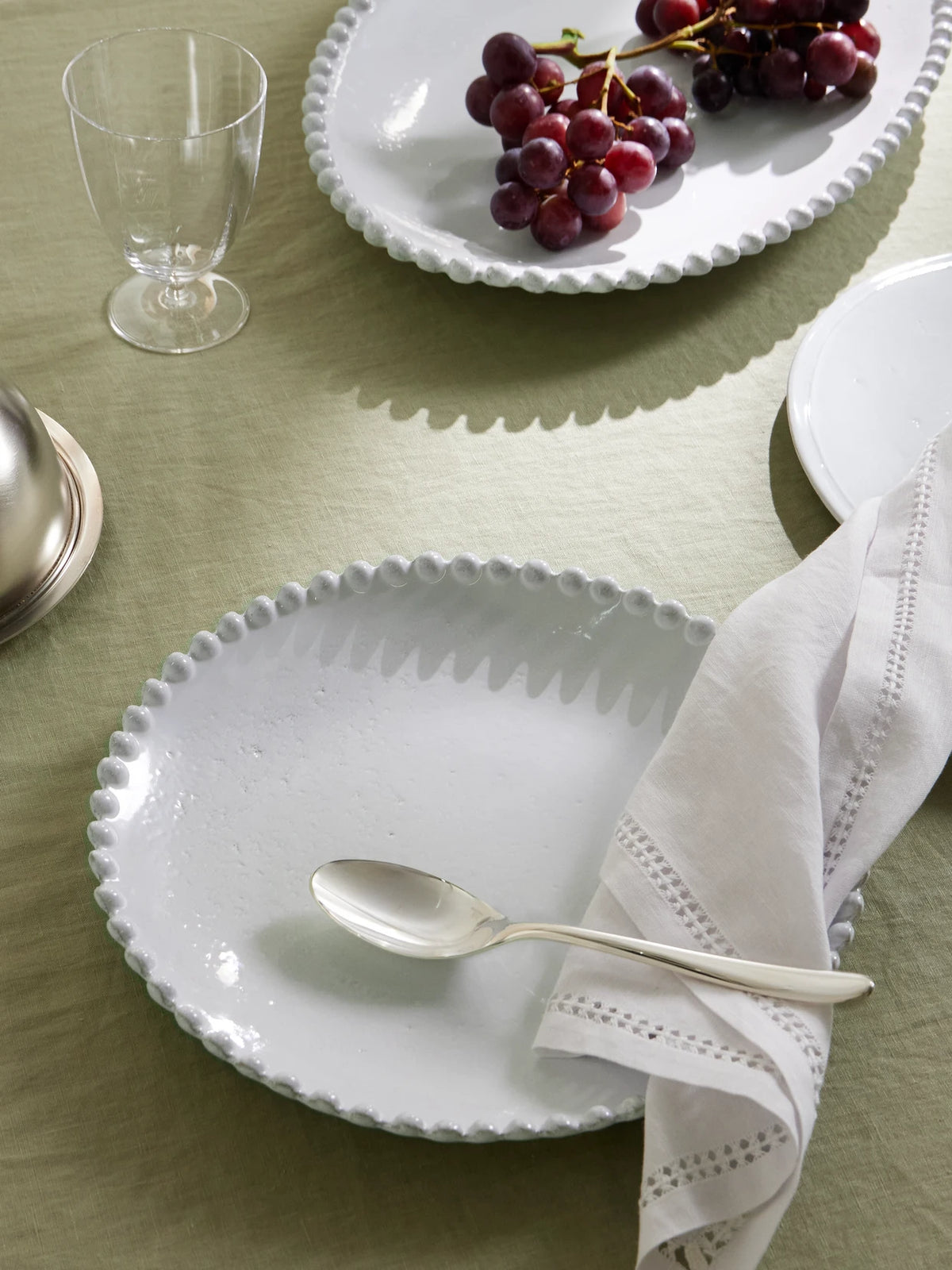 Image of Tableware. Product name - Adélaïde Ceramic Dinner Plate in White colour by brand - Astier De Villatte