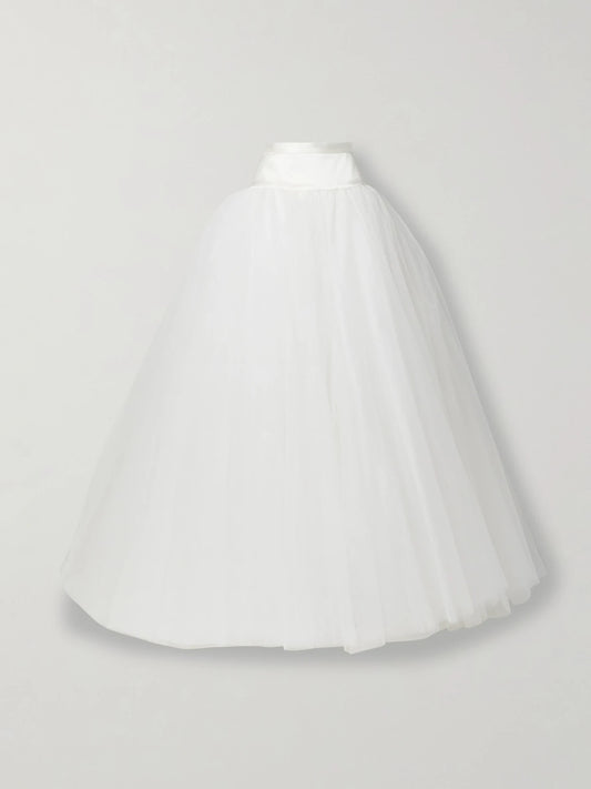 Image of a model wearing Skirts. Product name - Joe Petticoat Satin-trimmed Tulle And Crinoline Maxi Skirt in Ivory colour by brand - Vivienne Westwood