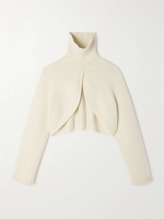 Image of a model wearing Outerwear. Product name - Cropped Cashmere-blend Turtleneck Sweater in Ivory colour by brand - Alaïa