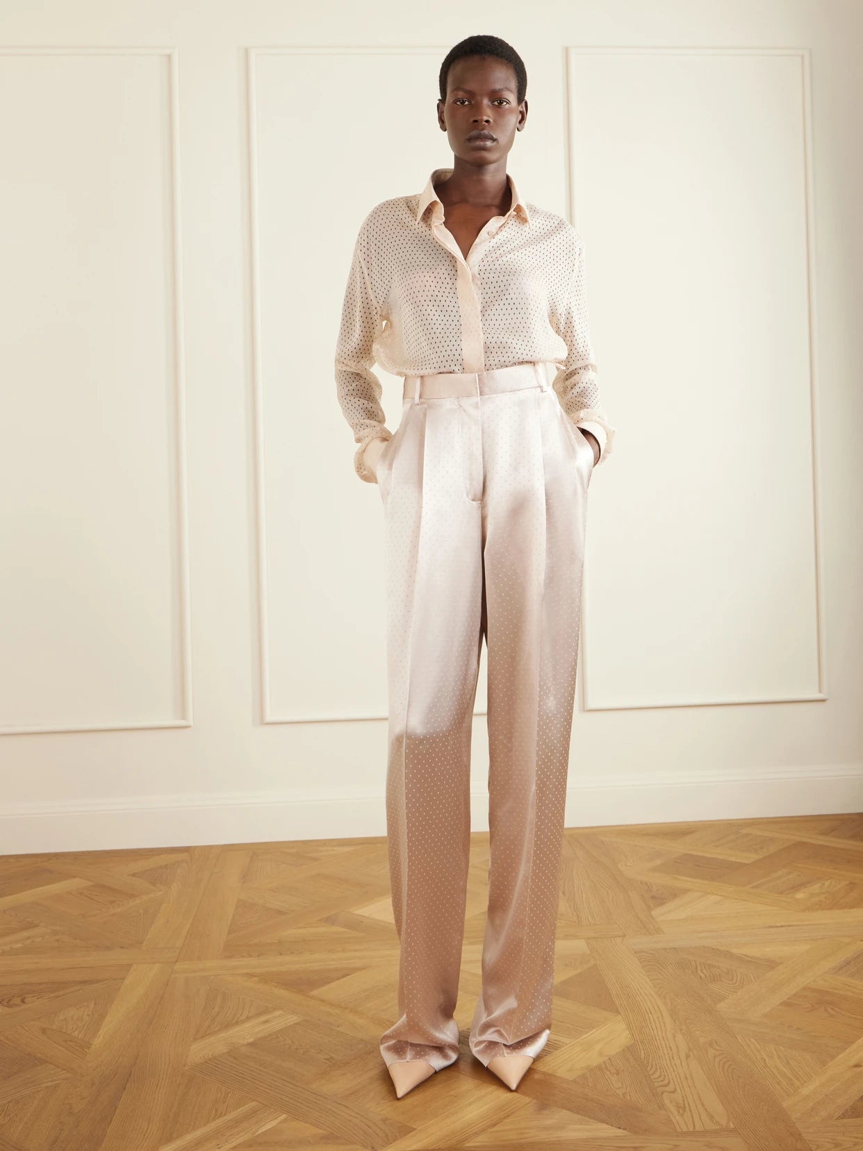Image of a model wearing Tops. Product name - Oversized Silk-chiffon Shirt in Baby pink colour by brand - TOM FORD