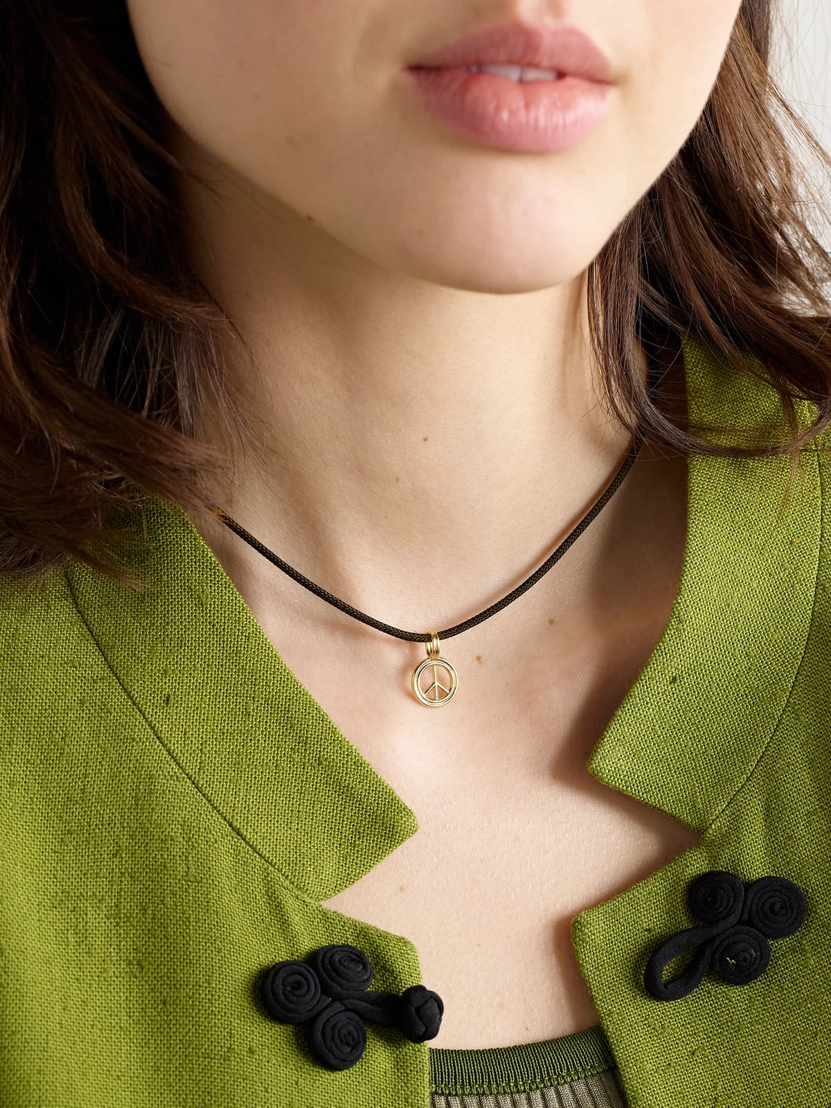 Image of Necklaces. Product name - Large Peace 14-karat Gold And Cord Choker in Black colour by brand - STONE AND STRAND