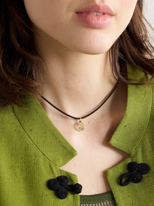 Image of Necklaces. Product name - Large Peace 14-karat Gold And Cord Choker in Black colour by brand - STONE AND STRAND