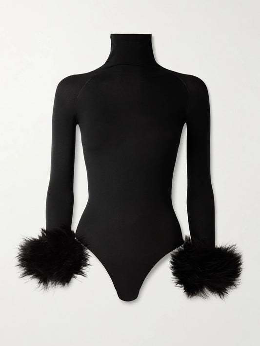 Image of a model wearing Tops. Product name - Shearling-trimmed Stretch-jersey Turtleneck Bodysuit in Black colour by brand - Alaïa