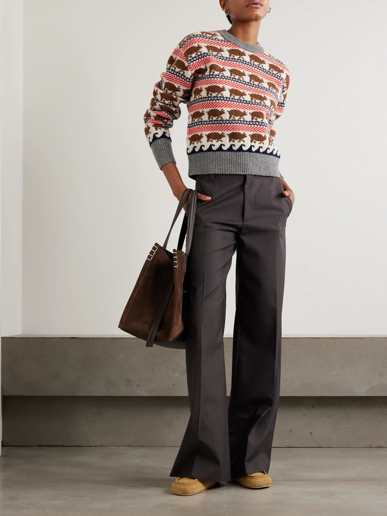 Image of a model wearing Outerwear. Product name - Intarsia Wool Sweater in Multi colour by brand - JW Anderson