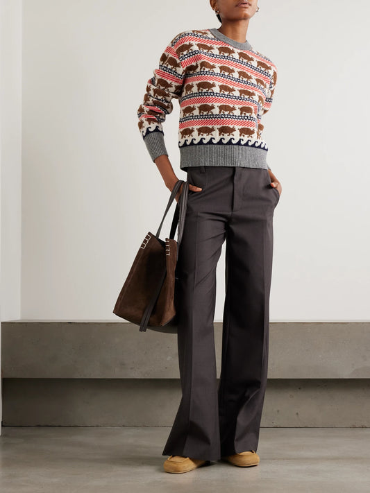 Image of a model wearing Outerwear. Product name - Intarsia Wool Sweater in Multi colour by brand - JW Anderson