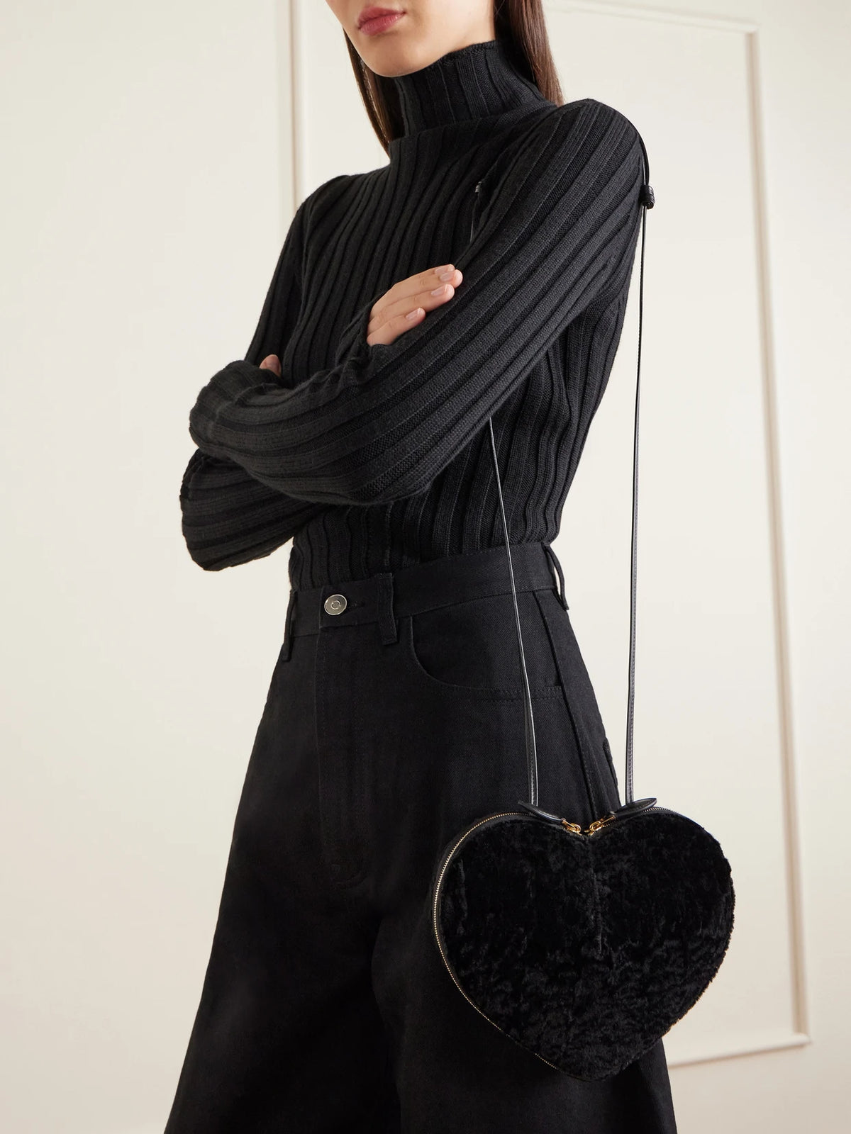 Image of Bags. Product name - Le Coeur Leather-trimmed Shearling Shoulder Bag in Black colour by brand - Alaïa