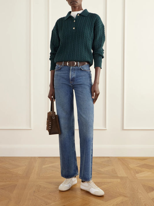 Image of a model wearing Outerwear. Product name - Dottie Cable-knit Sweater in Teal colour by brand - Varley