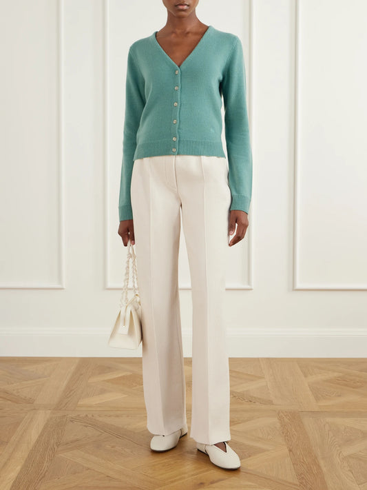 Image of a model wearing Outerwear. Product name - Cardi Wool And Cashmere-blend Cardigan in Sage green colour by brand - HIGH SPORT