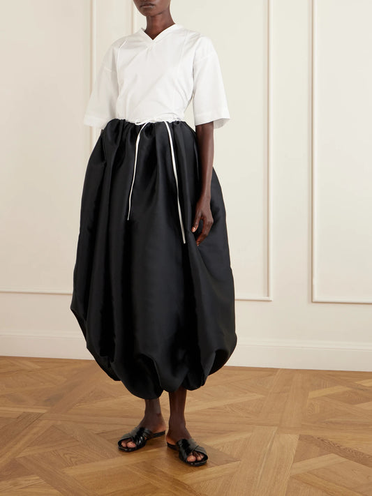 Image of a model wearing Tops. Product name - Lynn Cotton-poplin Wrap Blouse in Off-white colour by brand - Calvin Klein Collection