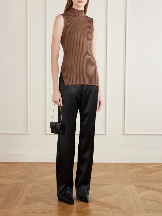 Image of a model wearing Outerwear. Product name - Karla Ribbed Wool And Silk-blend Tank in Brown, Chartreuse colour by brand - KHAITE