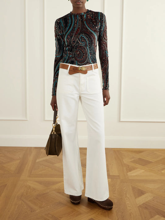 Image of a model wearing Tops. Product name - Printed Velvet-trimmed Mesh Blouse in Blue colour by brand - Etro