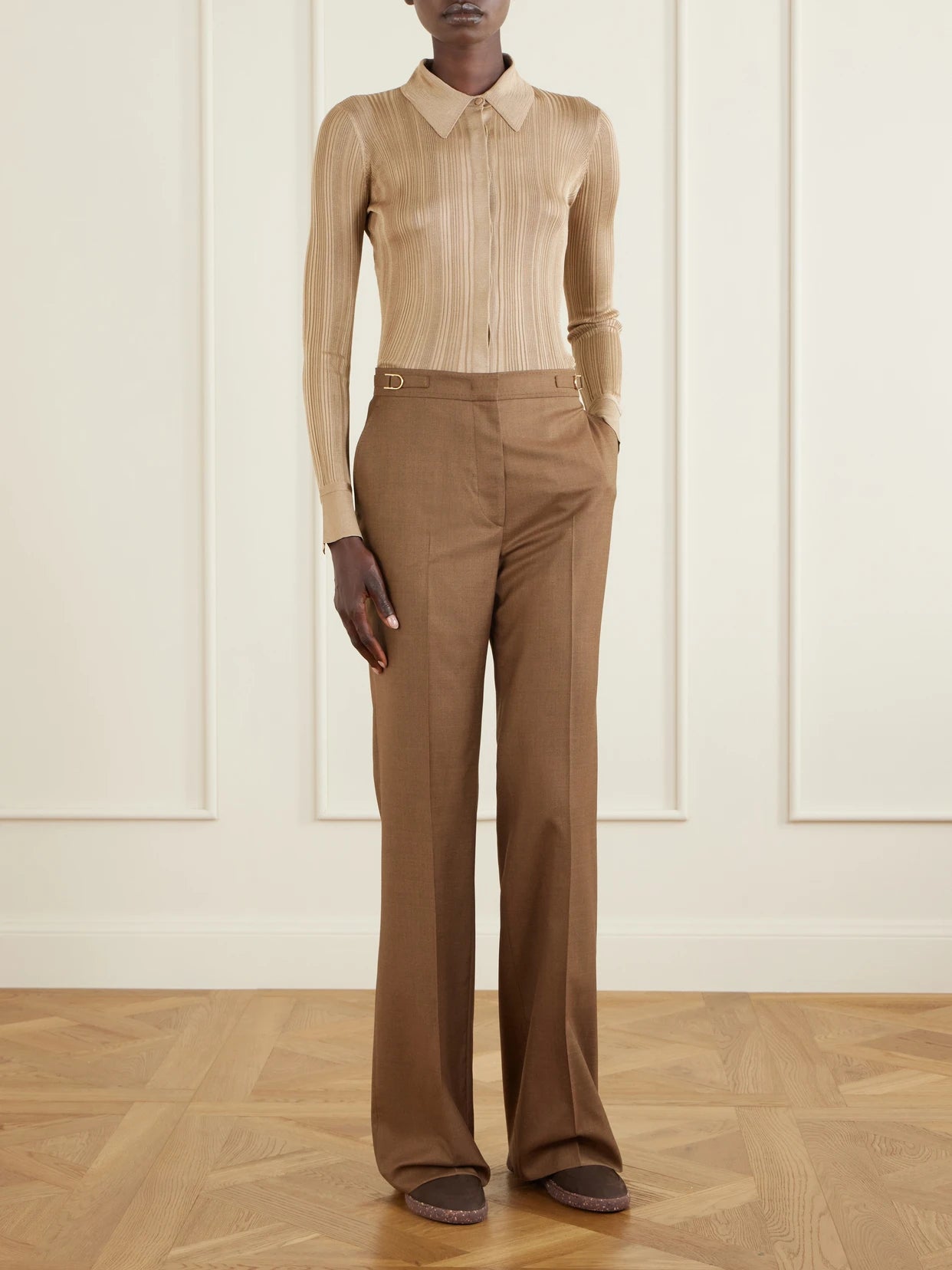 Image of a model wearing Tops. Product name - Tamar Ribbed Silk Shirt in Camel colour by brand - Gabriela Hearst
