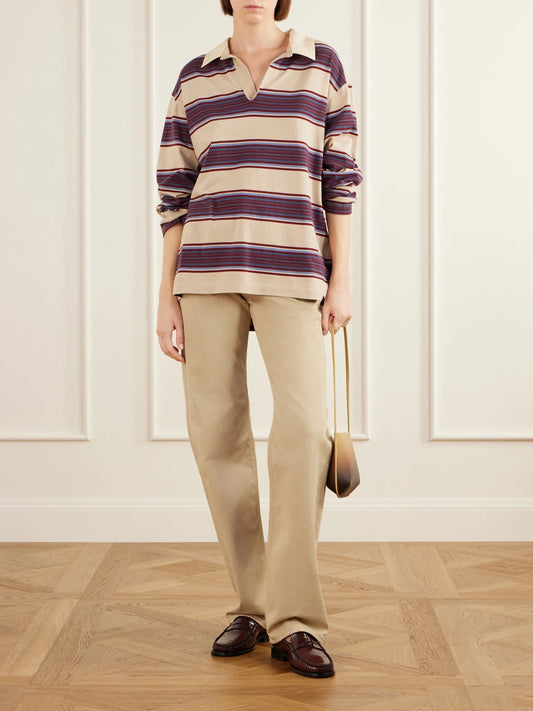 Image of a model wearing Tops. Product name - Striped Cotton-jersey Polo Shirt in Multi colour by brand - Sanderlak