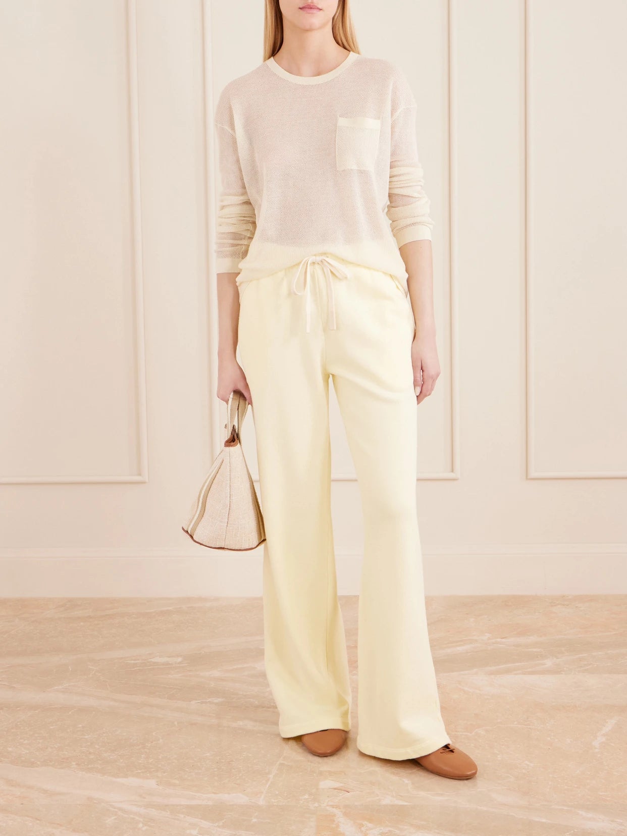 Image of a model wearing Outerwear. Product name - Wsh Crocheted Cashmere Sweater in Beige colour by brand - TWP