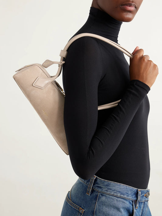 Image of Bags. Product name - Le Teckel Small Leather-trimmed Suede Shoulder Bag in Beige colour by brand - Alaïa