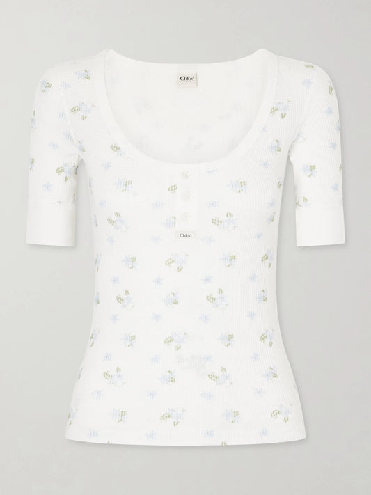 Image of a model wearing Tops. Product name - Floral-print Waffle-knit Cotton-jersey T-shirt in White colour by brand - Chloé
