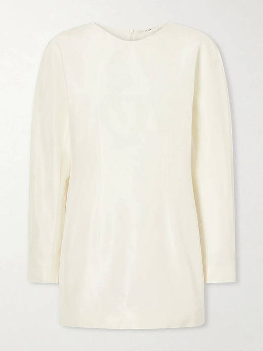 Image of a model wearing Tops. Product name - Elione Cotton And Silk Blouse in White colour by brand - The Row
