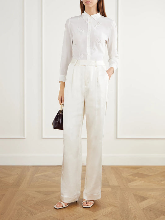 Image of a model wearing Tops. Product name - Baby Bead-embellished Silk-crepe De Chine Shirt in White colour by brand - BERNADETTE