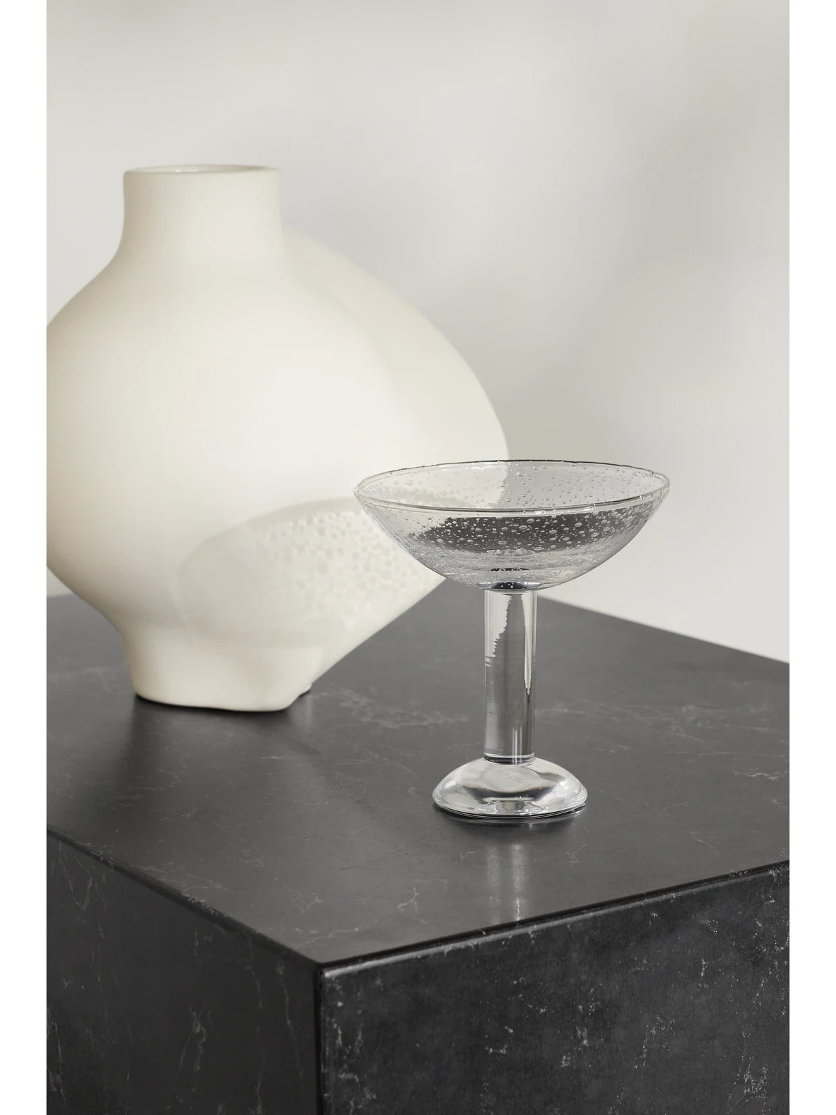 Image of Tableware. Product name - Bubble Glass Champagne Coupe in Clear colour by brand - LOUISE ROE