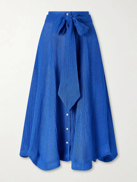Image of a model wearing Skirts. Product name - Linen-blend Midi Skirt in Blue colour by brand - Lisa Marie Fernandez