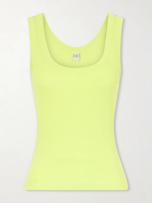 Image of a model wearing Tops. Product name - Hillie Organic Cotton-jersey Tank Top in Yellow colour by brand - FLORE FLORE