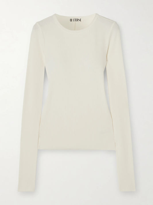 Image of a model wearing Tops. Product name - Ribbed Stretch Cotton And Modal-blend Top in Cream colour by brand - ÉTERNE