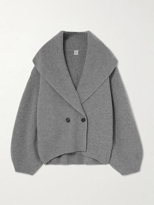 Image of a model wearing Outerwear. Product name - Oversized Ribbed Wool Cardigan in Gray colour by brand - TOTEME