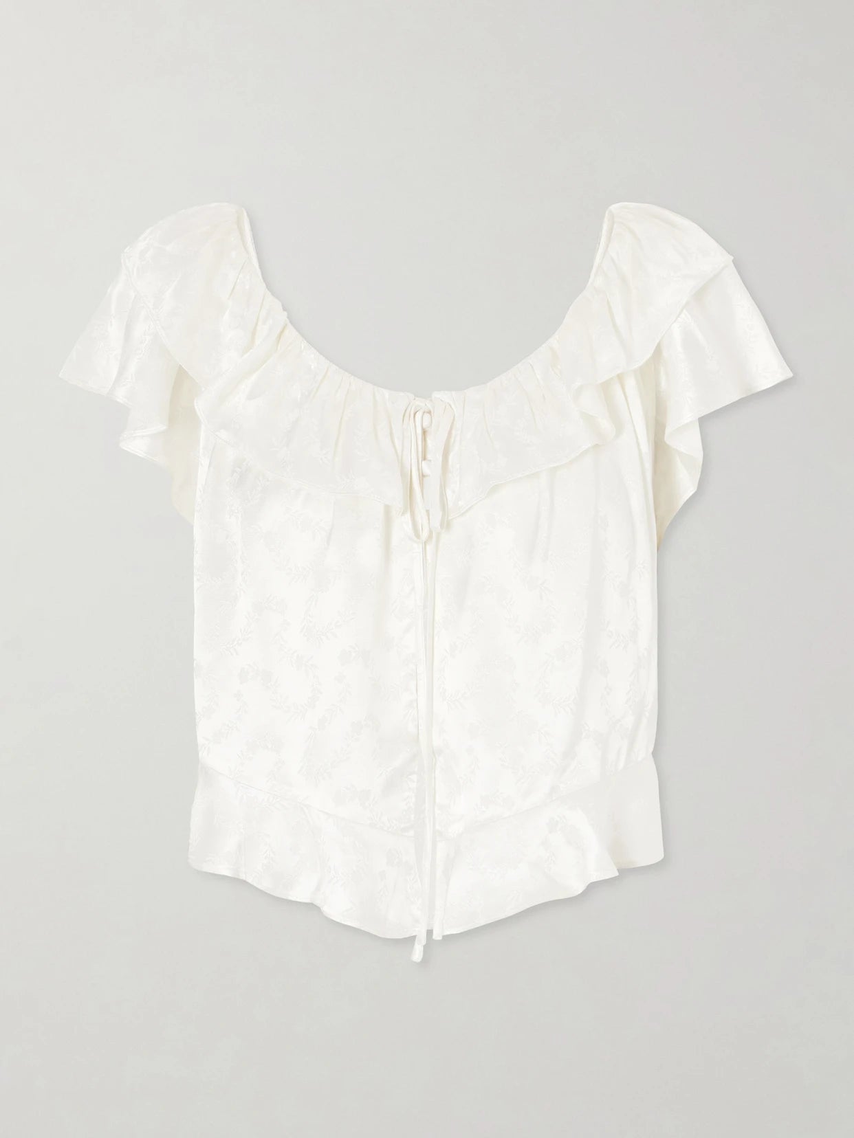 Image of a model wearing Tops. Product name - Floriette Ruffled Satin-jacquard Blouse in White colour by brand - DÔEN