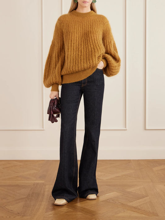 Image of a model wearing Outerwear. Product name - Valiant Mohair-blend Sweater in Light brown colour by brand - Zimmermann