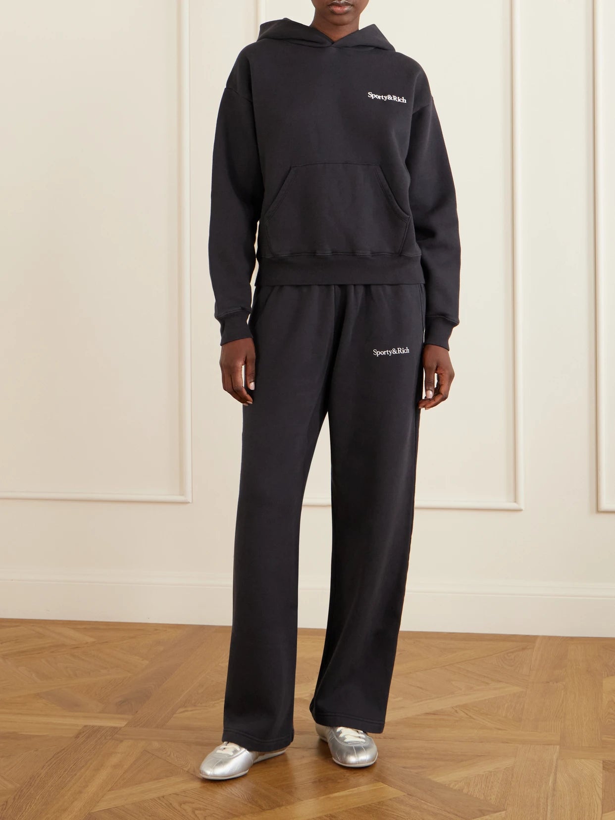 Image of Sleepwear & Loungewear. Product name - Logo-embroidered Cotton Wide-leg Pants in Black colour by brand - Sporty & Rich