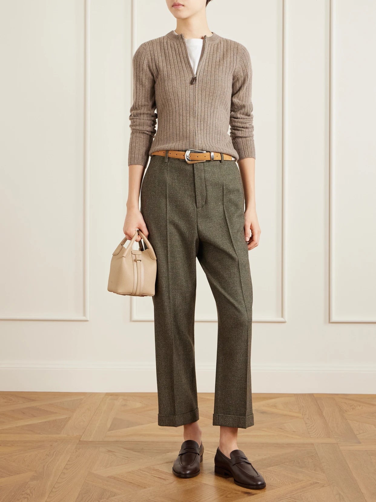 Image of a model wearing Outerwear. Product name - Ribbed Cashmere Cardigan in Brown colour by brand - Loro Piana