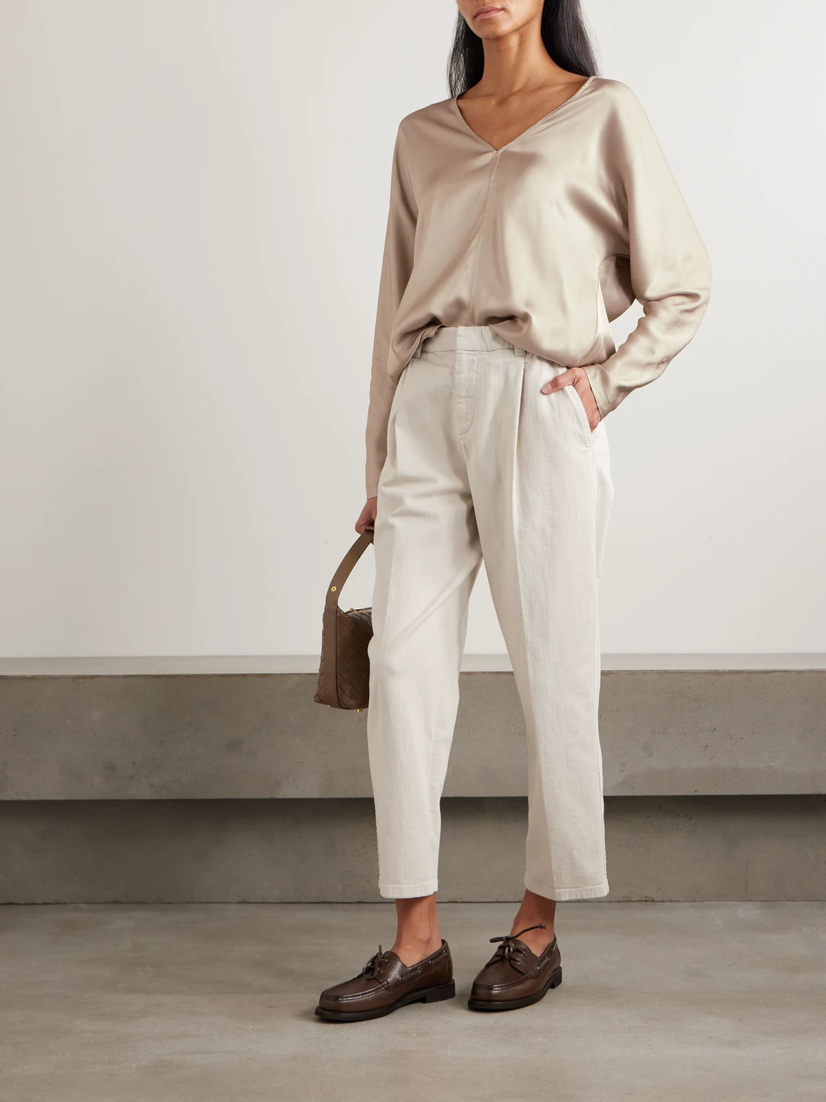Image of a model wearing Tops. Product name - Silk-satin Blouse in Taupe colour by brand - Brunello Cucinelli