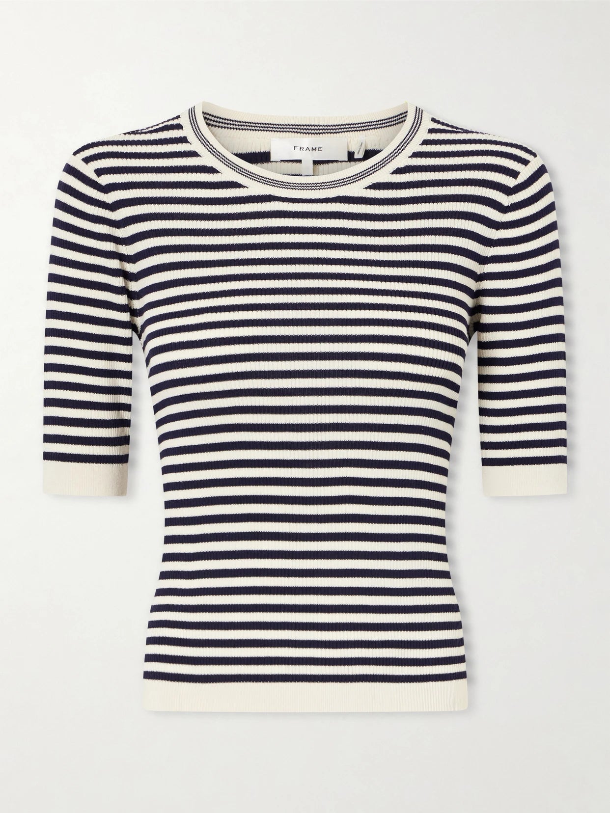 Image of a model wearing Tops. Product name - Striped Cotton-blend T-shirt in Black colour by brand - FRAME